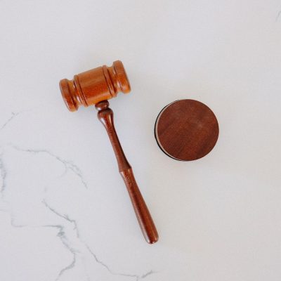 brown wooden smoking pipe on white surface